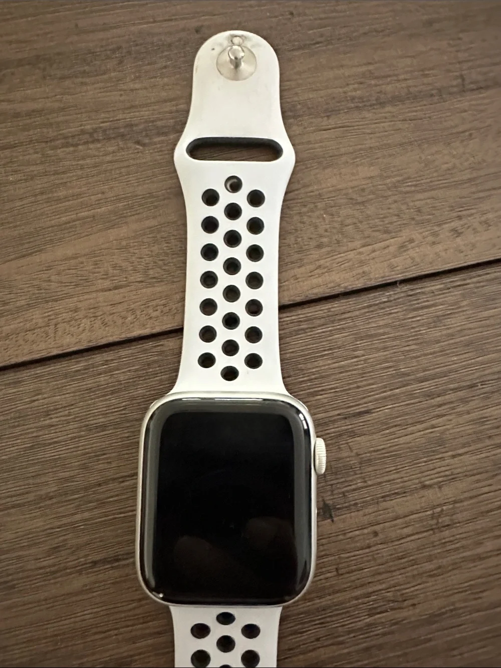 Apple Watch with White Perforated Sport Band. Nike addition series 5
